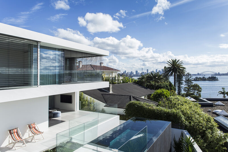 Highly glazed home, overlooking the Australian coast, featuring panoramah! sliding door systems