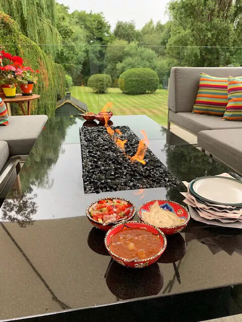 Fire table doubles as an al fresco dining area