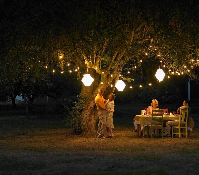 Couple dancing in outdoor entertainment space