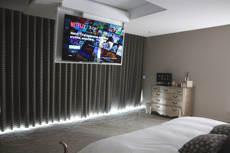 Concealed television in ceiling