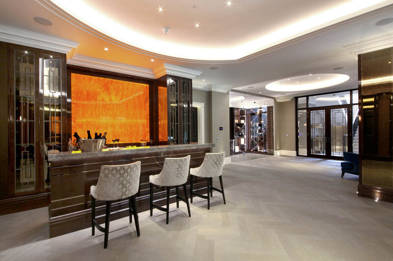 Natural wood effect flooring provides a base in which accents of vivid and rich colours can make a striking effect.