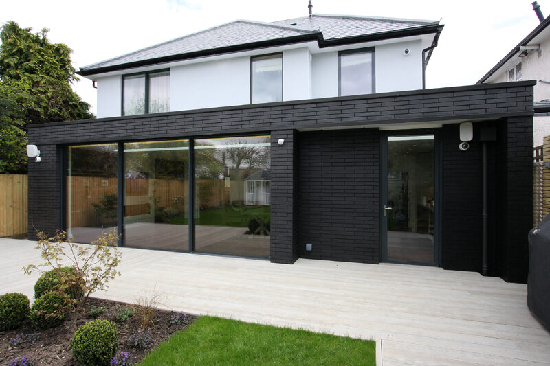 Aluminium casement door to smaller opening to side of sliding patio doors 