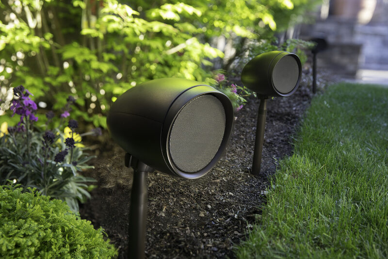 Hidden speakers in flower bed