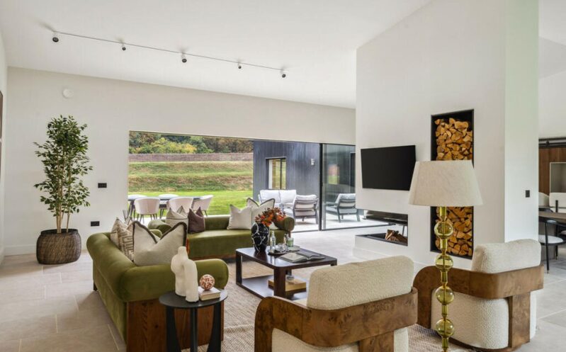 Luxury home Chalfont St Giles living room featuring Sliding doors