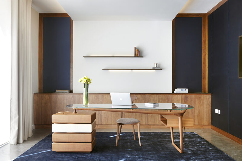 Home office using neutral colour scheme, wooden furniture and earthy wall colours