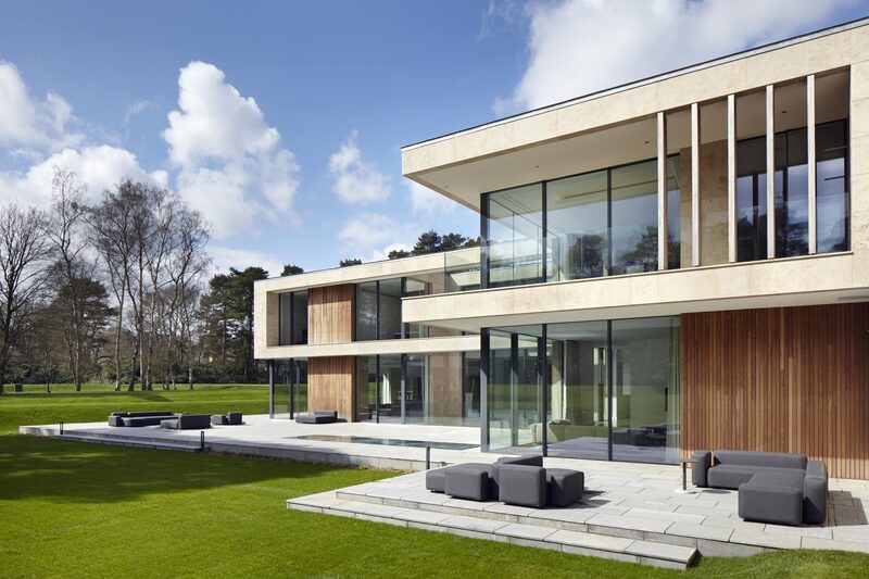 Highly glazed new build in green belt area