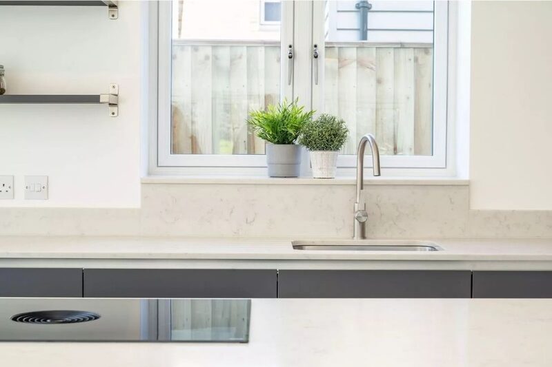 close up of a white themed kitchen interior