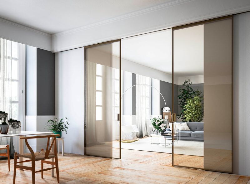 Internal sliding glass doors separating living room from home office