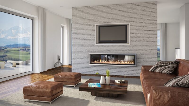 Fireplace within wall structure, separating living spaces