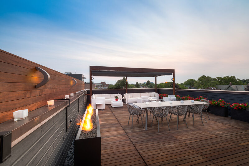 fire table in sky garden with outdoor dining area