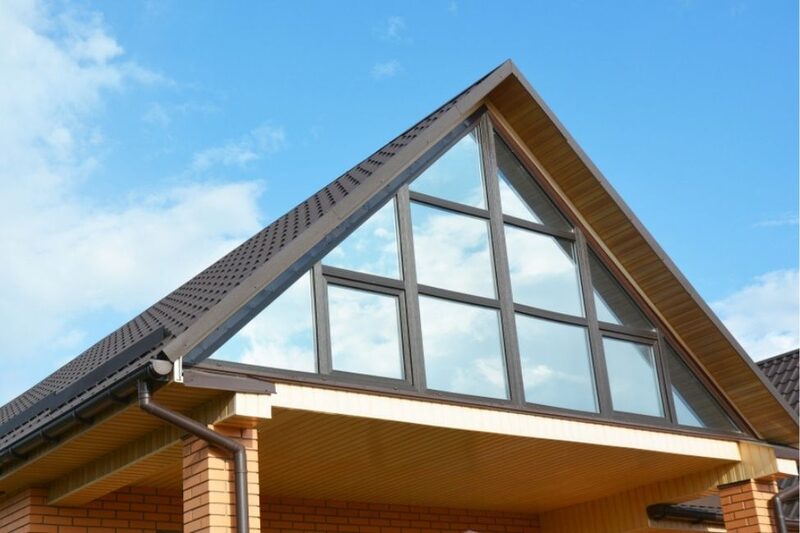 loft conversion with floor to ceiling glazing and gable end windows