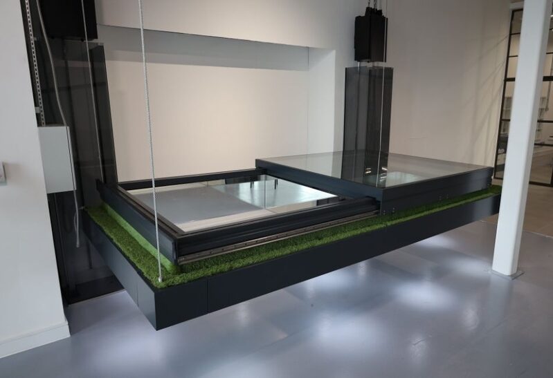 automated opening rooflight system at glazing showroom in Amersham
