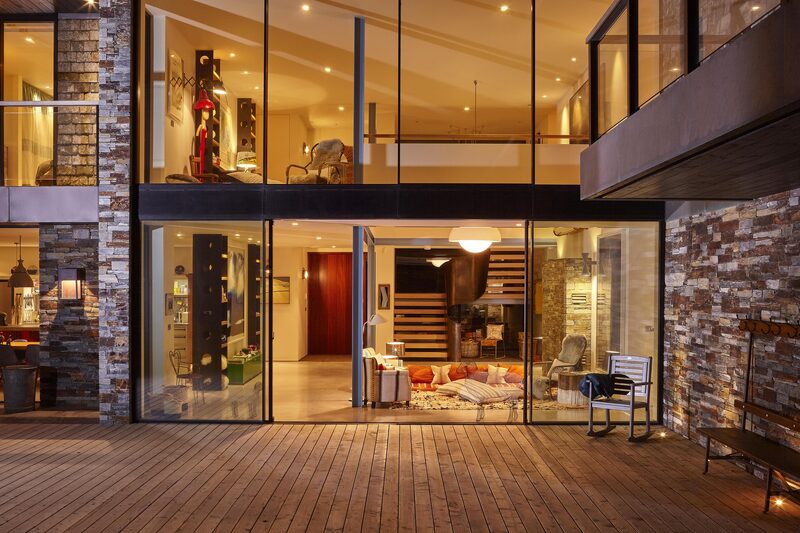 Oversized sliding glass doors creating an indoor outdoor style of living