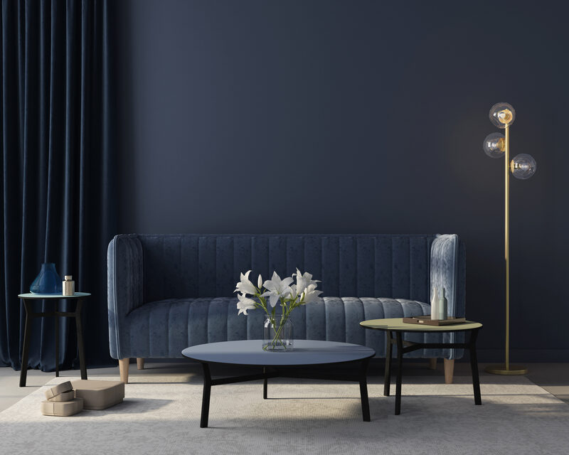 Navy blue sofa, walls and interior theme