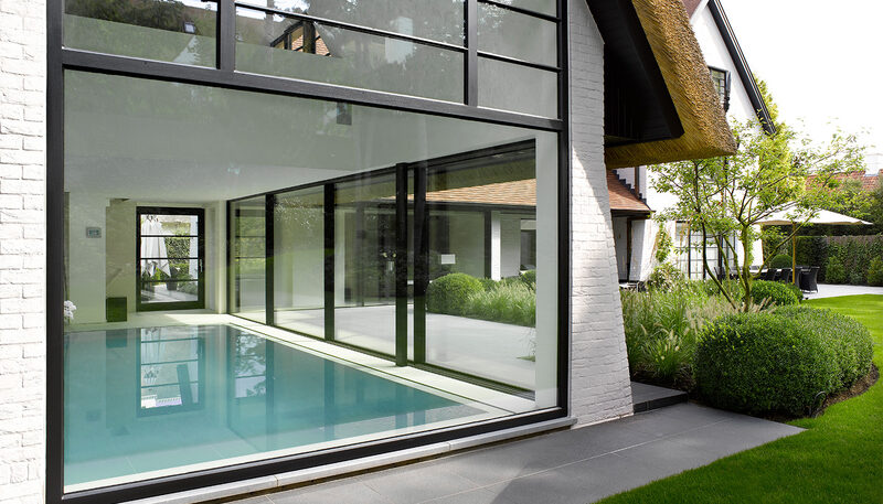 Thatched roof houses - Sky House Design Centre - Thatched Roof Glass Pool House