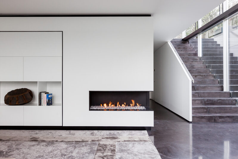 two sided corner glass fireplace